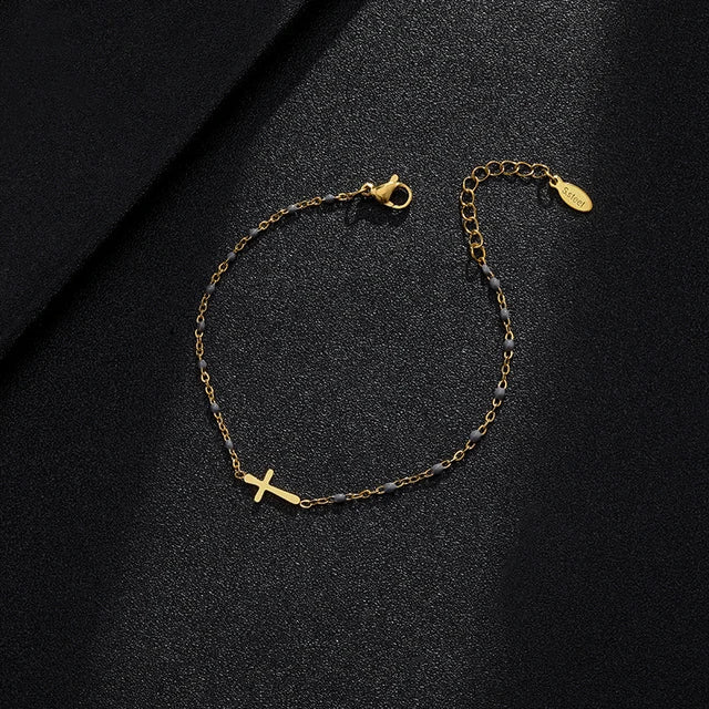 W&W Mode | Goldfarbene Kreuzarmband