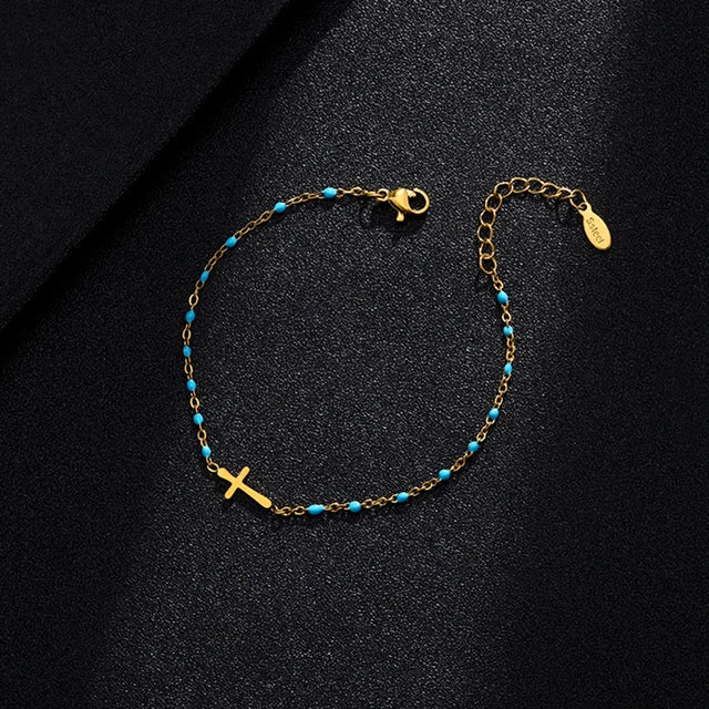 W&W Mode | Goldfarbene Kreuzarmband