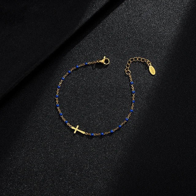 W&W Mode | Goldfarbene Kreuzarmband
