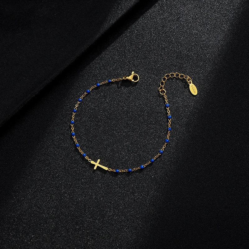 W&W Mode | Goldfarbene Kreuzarmband