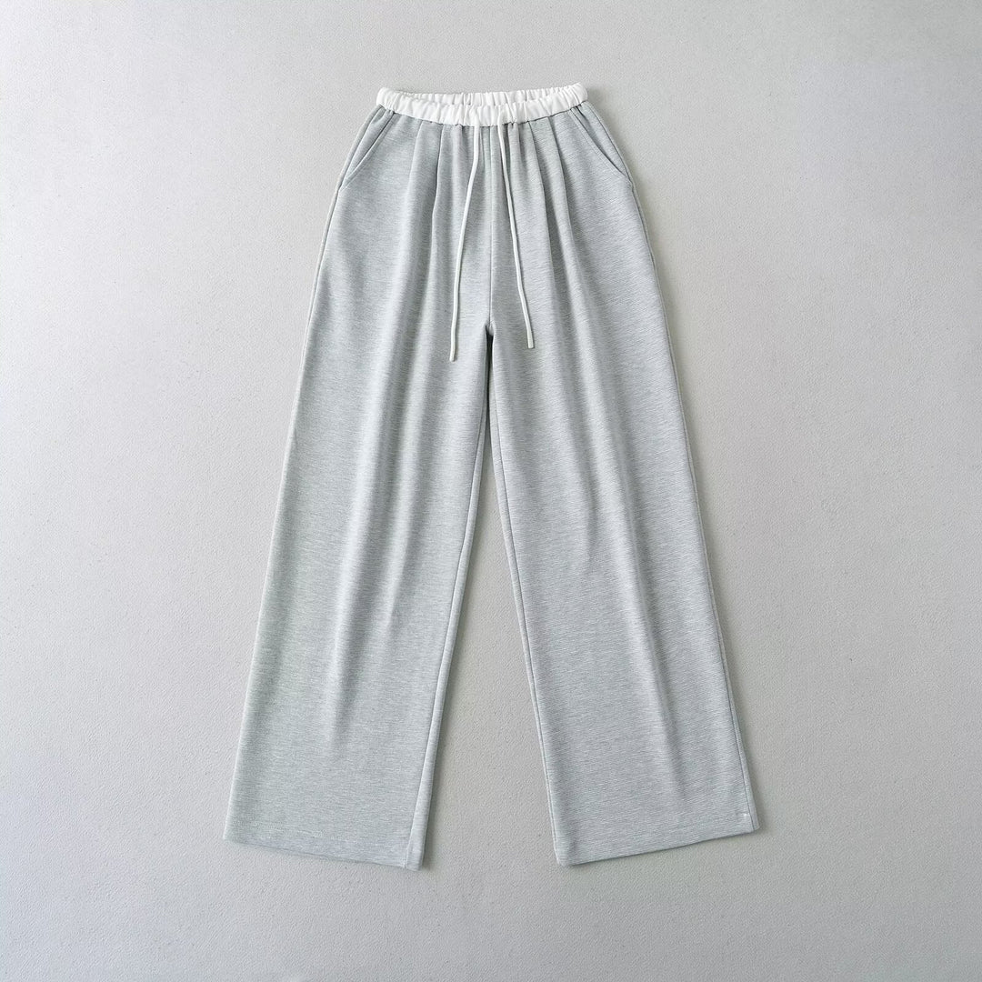 Damen gemütliche Sweatpants mit elastischem Bund und seitlichen Taschen W&W Mode