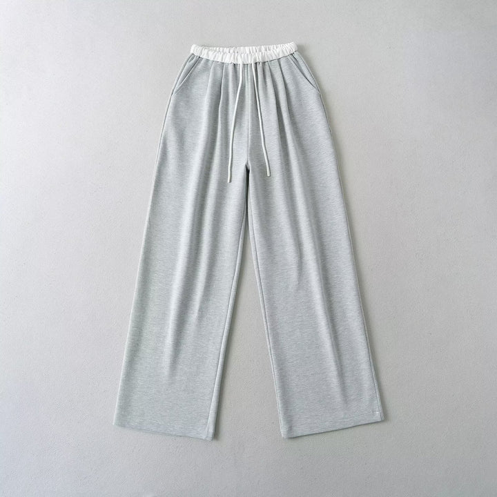 Damen gemütliche Sweatpants mit elastischem Bund und seitlichen Taschen W&W Mode