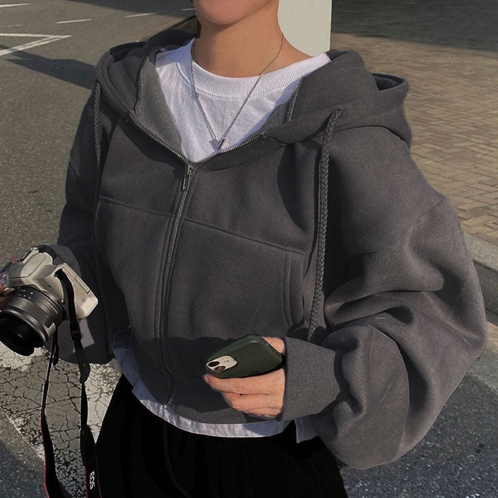 Damen Kapuzenpullover mit oversized Schnitt und praktischen Taschen W&W Mode
