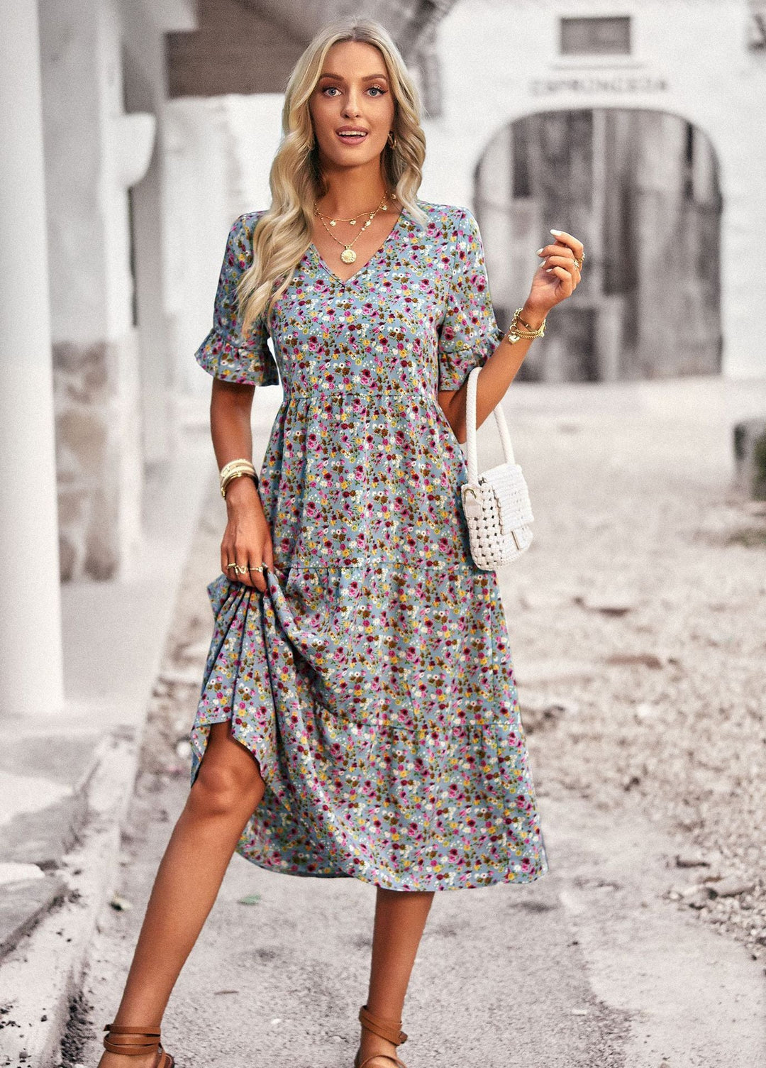 Damen Midi-Kleid mit floralem Muster und verspieltem V-Ausschnitt W&W Mode