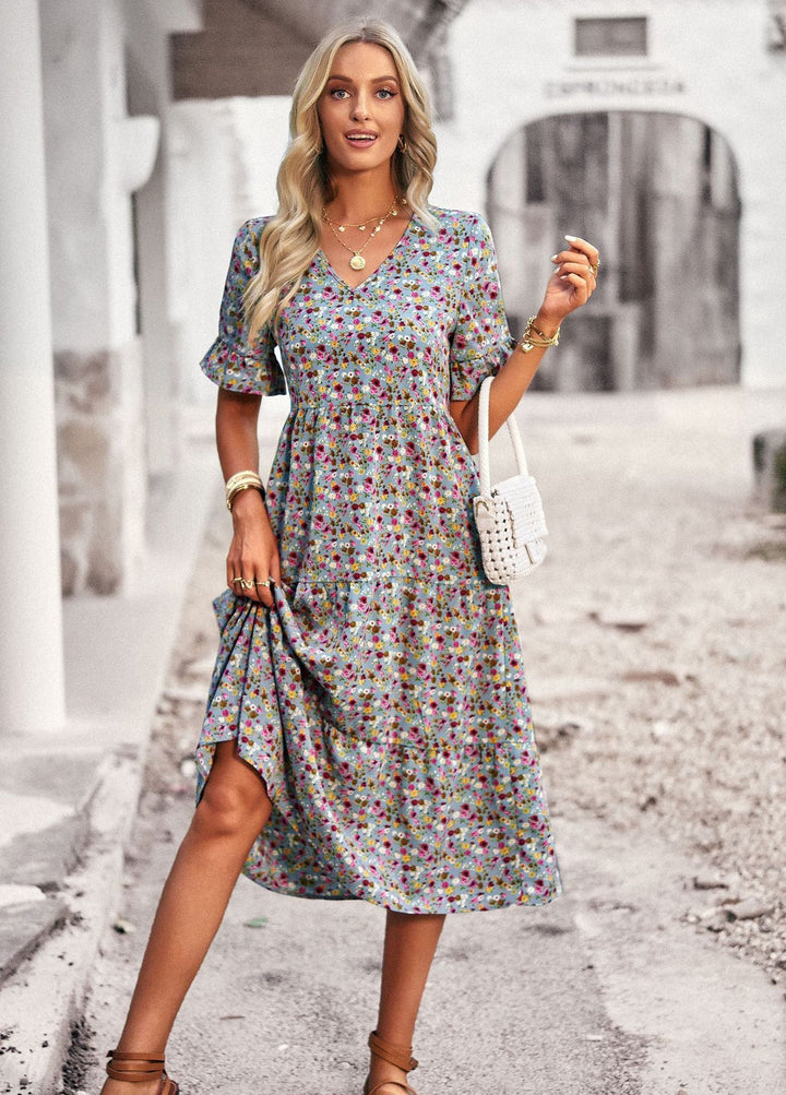 Damen Midi-Kleid mit floralem Muster und verspieltem V-Ausschnitt W&W Mode