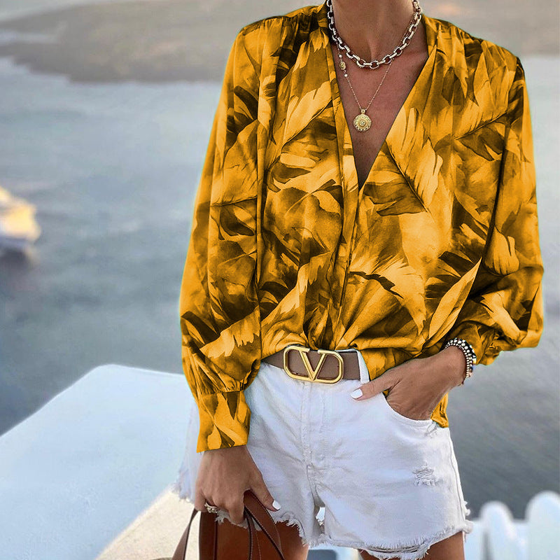 Damen Bluse mit floralem Muster und tiefem V-Ausschnitt W&W Mode