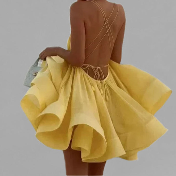 Damen Sommerkleid mit tiefem V-Ausschnitt und verspieltem Saum W&W Mode
