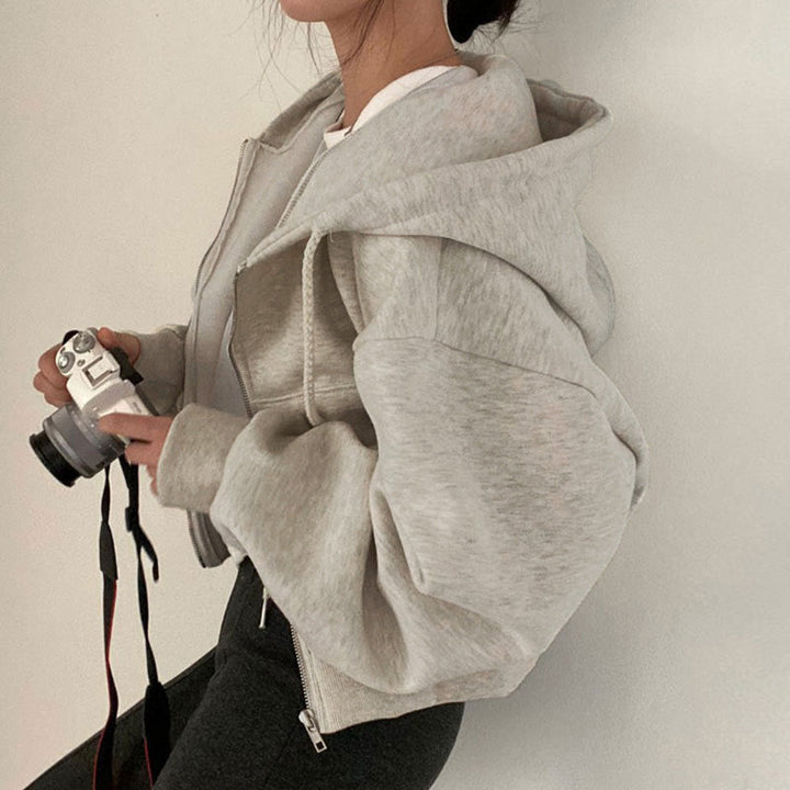 Damen Kapuzenpullover mit oversized Schnitt und praktischen Taschen W&W Mode