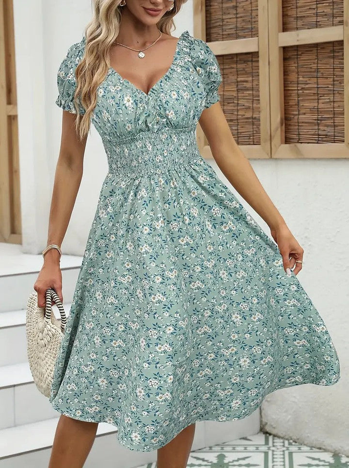 Damen Floral Midi-Kleid mit elastischem Bund und Puffärmeln W&W Mode