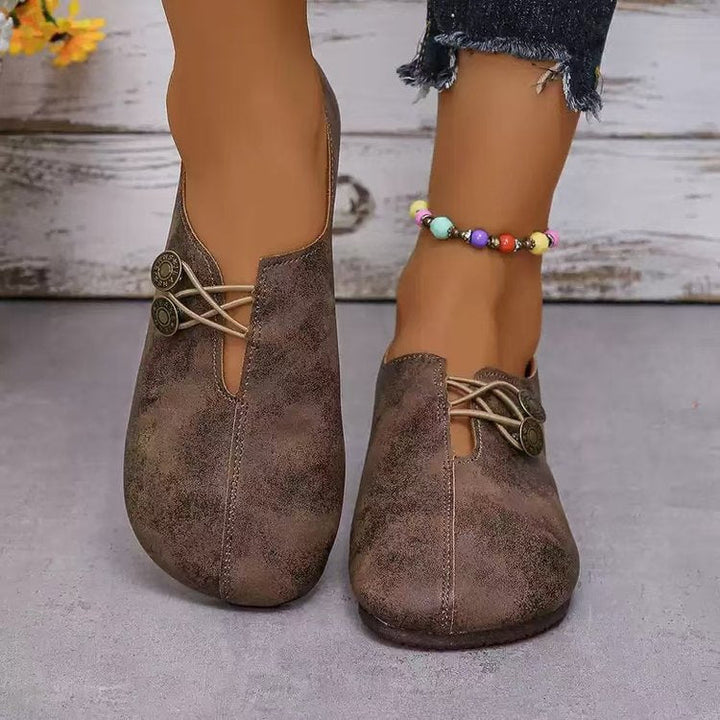 Damen Komfortable und stilvolle Slipper mit dekorativen Schnürdetails W&W Mode