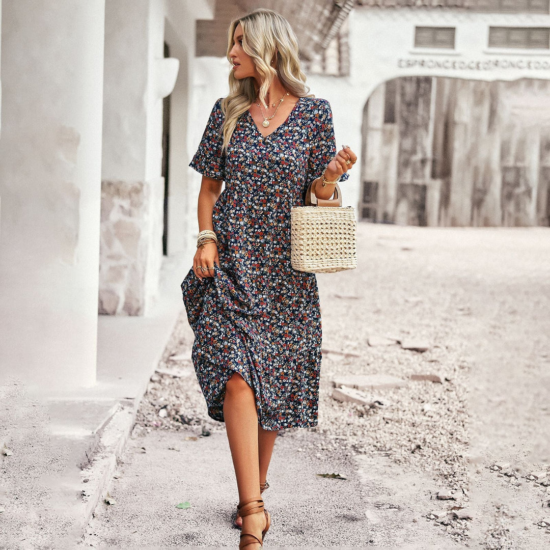 Damen Midi-Kleid mit floralem Muster und verspieltem V-Ausschnitt W&W Mode