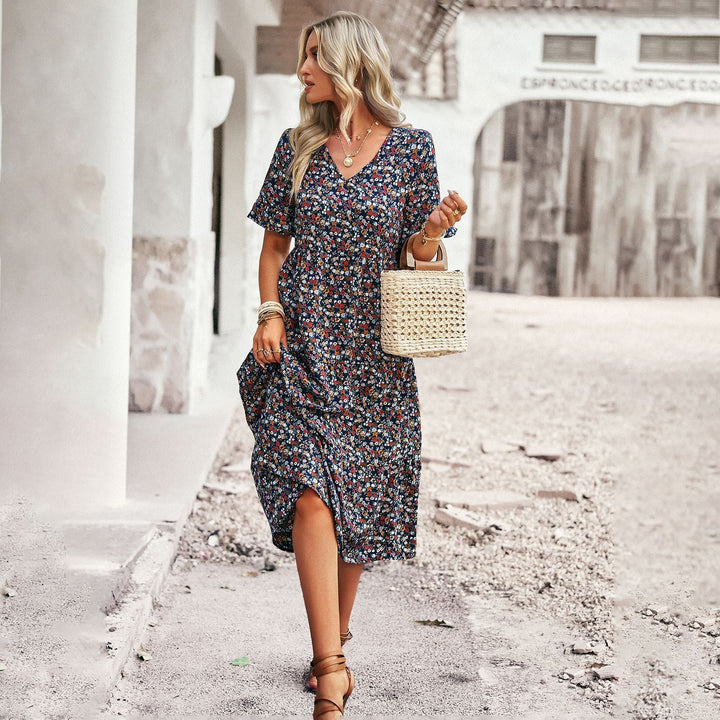 Damen Midi-Kleid mit floralem Muster und verspieltem V-Ausschnitt W&W Mode