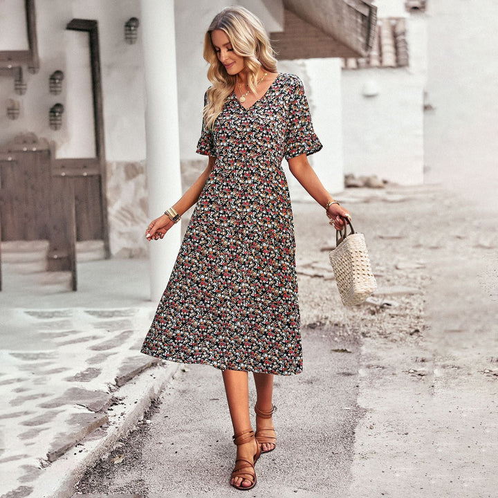 Damen Midi-Kleid mit floralem Muster und verspieltem V-Ausschnitt W&W Mode
