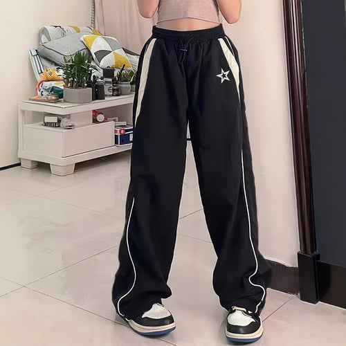 Damen Sportliche Weite Hose mit seitlichen Streifen und elastischem Bund W&W Mode