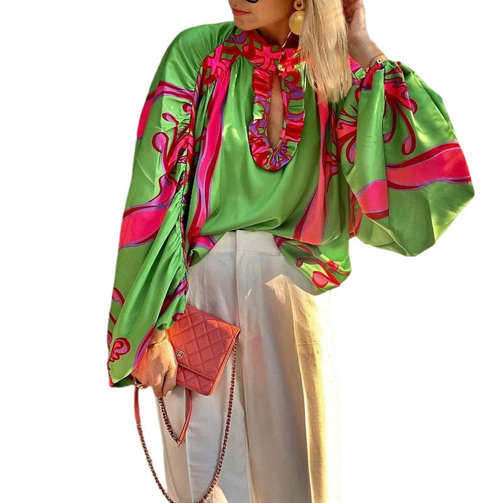 Damen Stylische Bluse mit voluminösen Ärmeln und farbenfrohem Muster W&W Mode