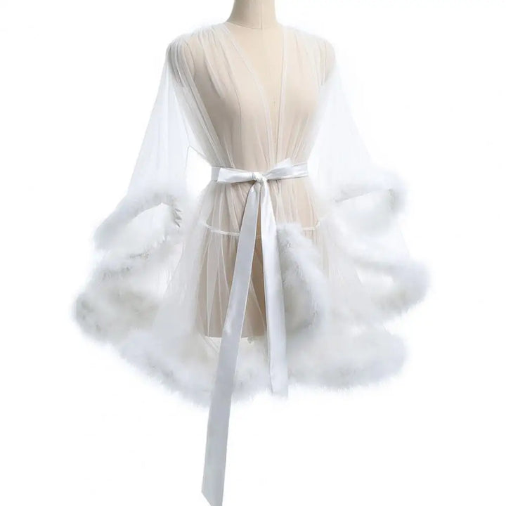 Damen Kleid aus transparentem Tüll mit Federsaum und Satinband