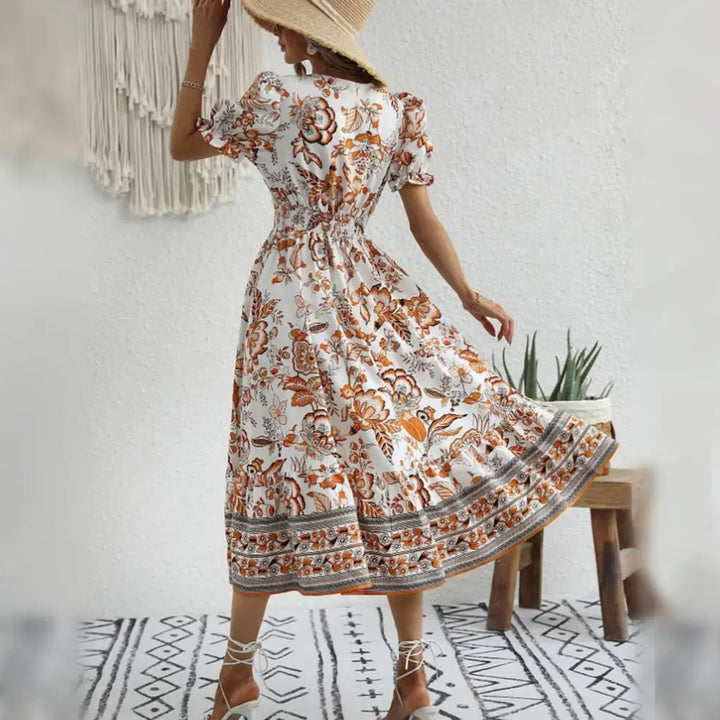 W&W Mode | Elegante Orange Blumenkleid