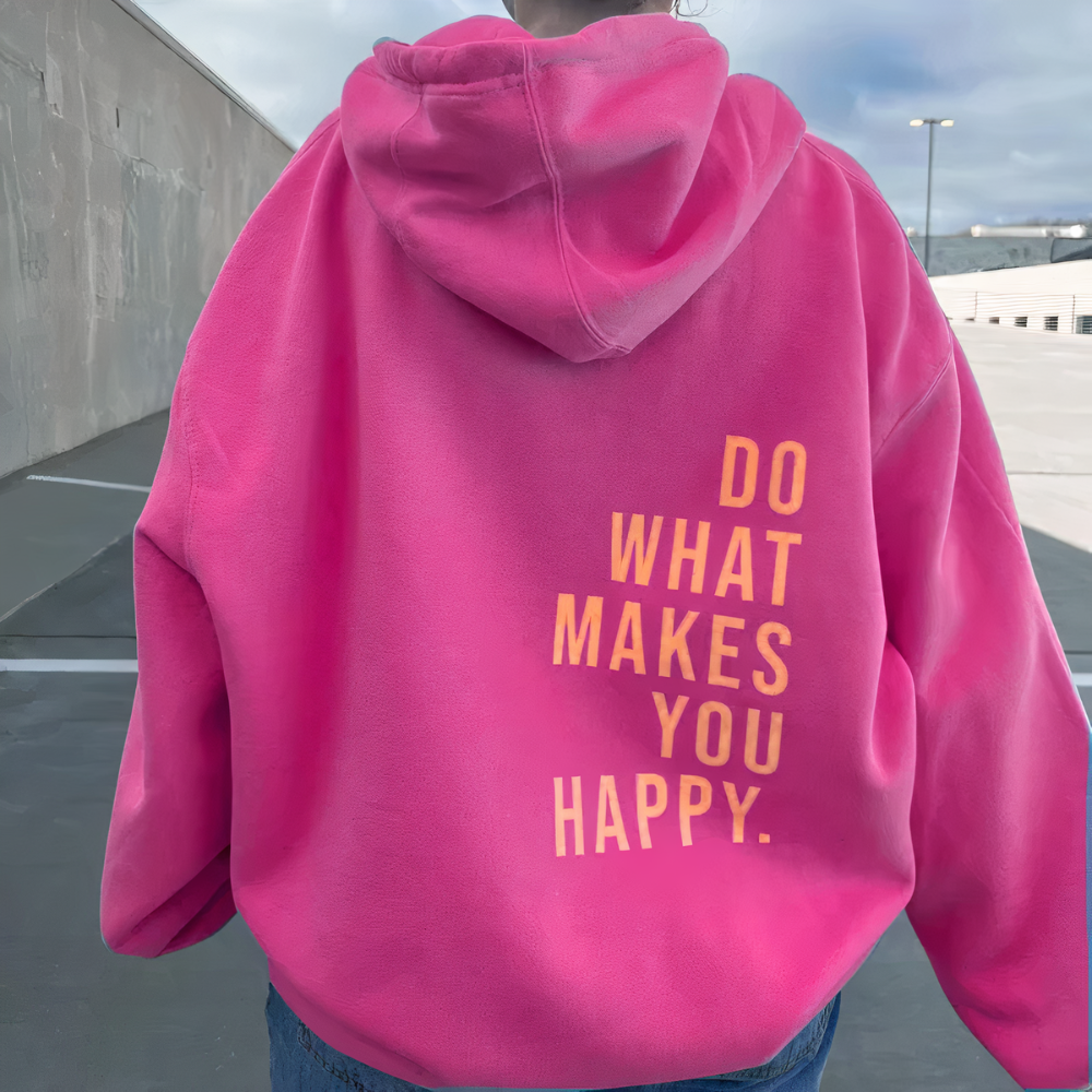 Rückansicht einer Frau mit modischem Rosa Kapuzenpullover