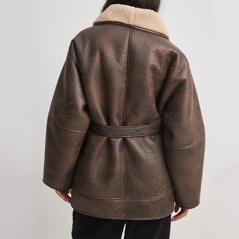 Damen Kunstlederjacke mit weichem Sherpa-Futter und Gürtel