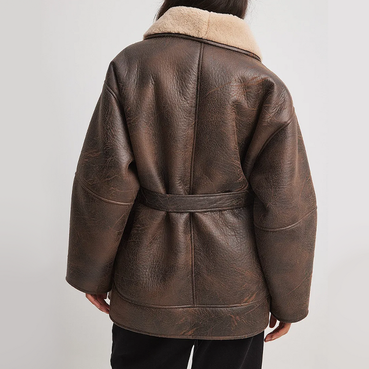 Damen Kunstlederjacke mit weichem Sherpa-Futter und Gürtel